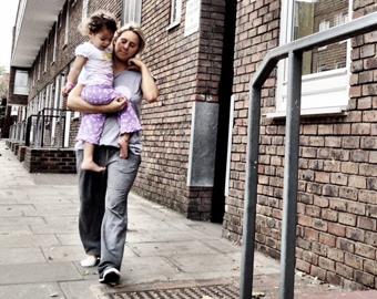 mother and daughter on housing estate
